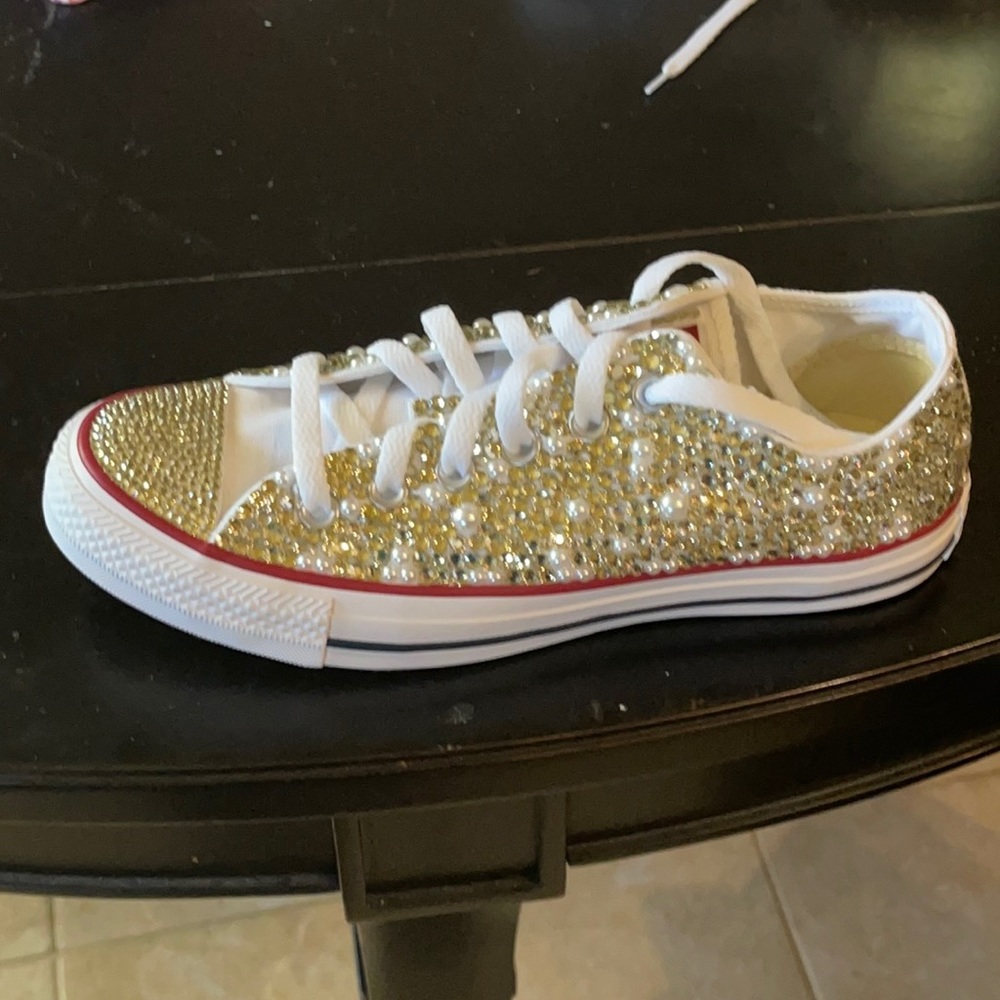 Brand new, never worn bedazzled Converse Women’s shoes, size 7.5.